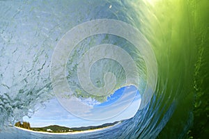 Water shot of a barreling wave breaking in the morning at Campeche beach in FLorianÃ³polis Brazil