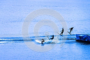 Water skier jumping