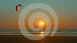 Water skiing at sunset.