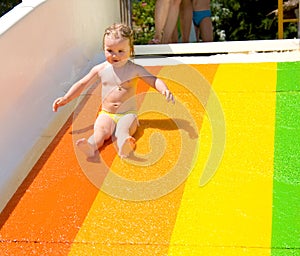 Water slide fun on outdoor pool