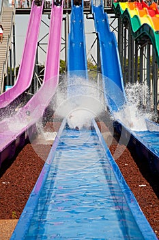 WATER SLIDE AT THE PARK .