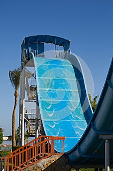 Water slide with sharp descent and ascent