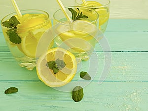 Water soda lemon citrus natural refreshment , freshness homemade health mint summer on a blue wooden background