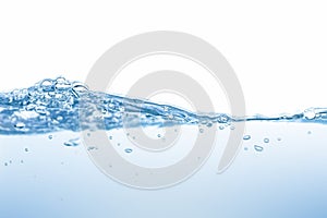 Water splash. Aqua flowing in waves and creating bubbles. Drops on the water surface feel fresh and clean. isolated on white backg