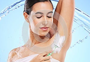 Water splash, beauty and woman with razor for shaving armpit with foam, cleaning products and cosmetics. Skincare, hair