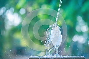 Water splash in glass Select focus blurred background