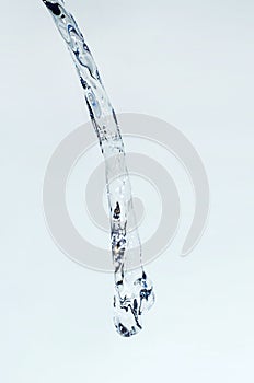 Water Splash jet isolate On light blue Background