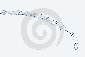 Water Splash jet isolate On light blue Background horizontal