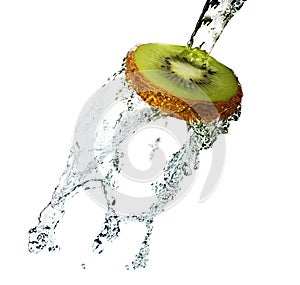 Water splash on kiwi on white