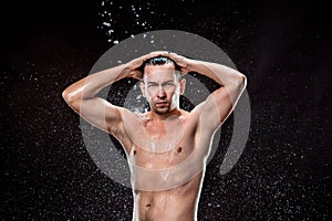 The water splash on male face