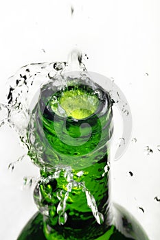 Water splash over bottle