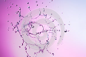 Water splash on a purple