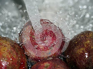 Water splash on washing passion fruit