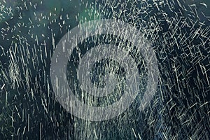 Water splashes on a dark blue background