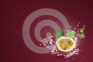 Water splashing on Fresh Passionfruit on red background