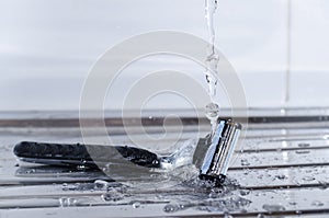 Water Splashing onto a Razor