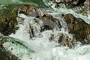 Water splashing over rocks