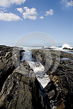 Water splashing over rocks