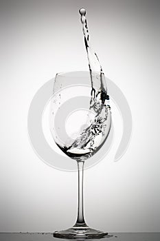 Water splashing in a wine glass