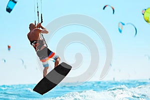 Water Sports. Kiteboarding, Kitesurfing In Ocean. Extreme Sport photo