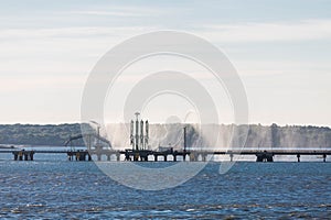 Water Spouts on Pier