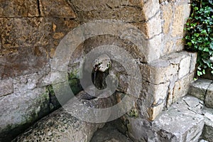 Water spring in Derbent, Russia. Fortress