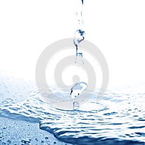 Water spurt before touching surface photo