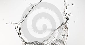 Water Spurting out against White Background,