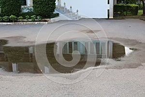 Water stagnating on the outdoor public road surface is dangerous.