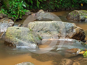 Water steam rocky river in the rain forest, nature background wallpaper