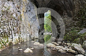 Water through stone tunnel