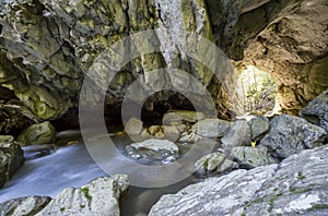 Water through stone tunnel