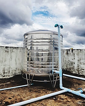 Water storage tank on rooftop of building