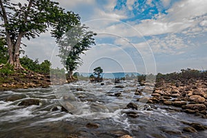 Water stream with blue sky background