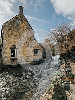 Water stream next to Halt Motoring Museum located in the picturesque village of Bourton on the Water