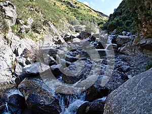 Water stream at a reserve near Villa de Merlo, Argentina photo
