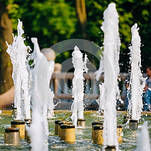 Water stream splashing on ground, fountain