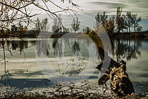 Water streams, rocks, trees and beatiful sky. Guatel reservoir. Galapagar, Madrid.