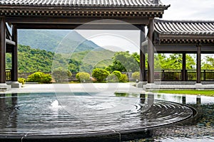 Water supply fountain in Japanese Buddhist garden at Tsz Shan Monastery in Hong Kong