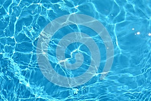 Water surface with a blue ripples