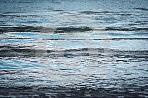 water surface in a lake or river. water in the sea. water in the ocean. water texture. dark water