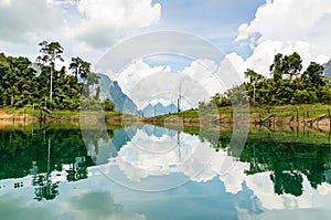 Water surface reflecting sky and cloud