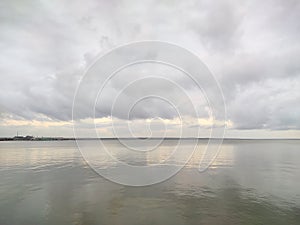 The water surface of the reservoir on a rainy cloudy day.