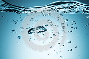 Water surface with ripple and bubble