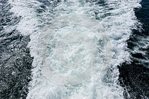 Water surface of the sea. View from ship stern with ship trace on water