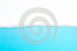 Water Surface Splash and wave bubbles blue water