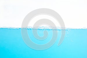 Water Surface Splash and wave bubbles blue water