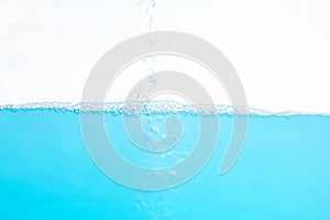 Water Surface Splash and wave bubbles blue water