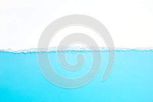 Water Surface Splash and wave bubbles blue water