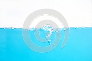 Water Surface Splash and wave bubbles blue water